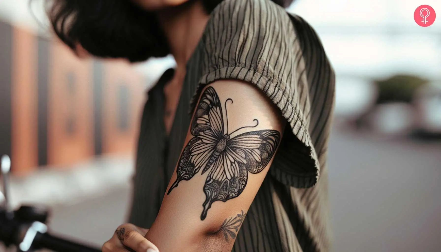 Linear butterfly tattoo