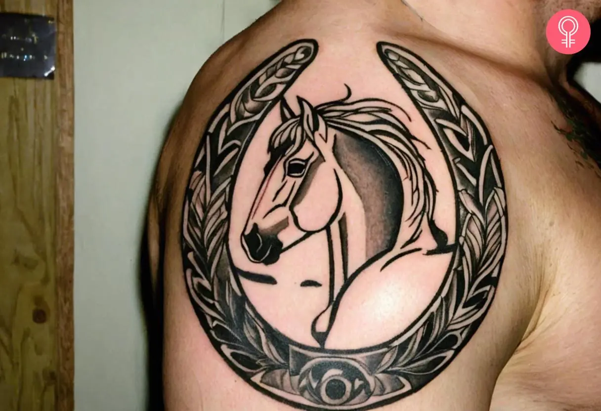 Lucky horseshoe tattoo on the shoulder