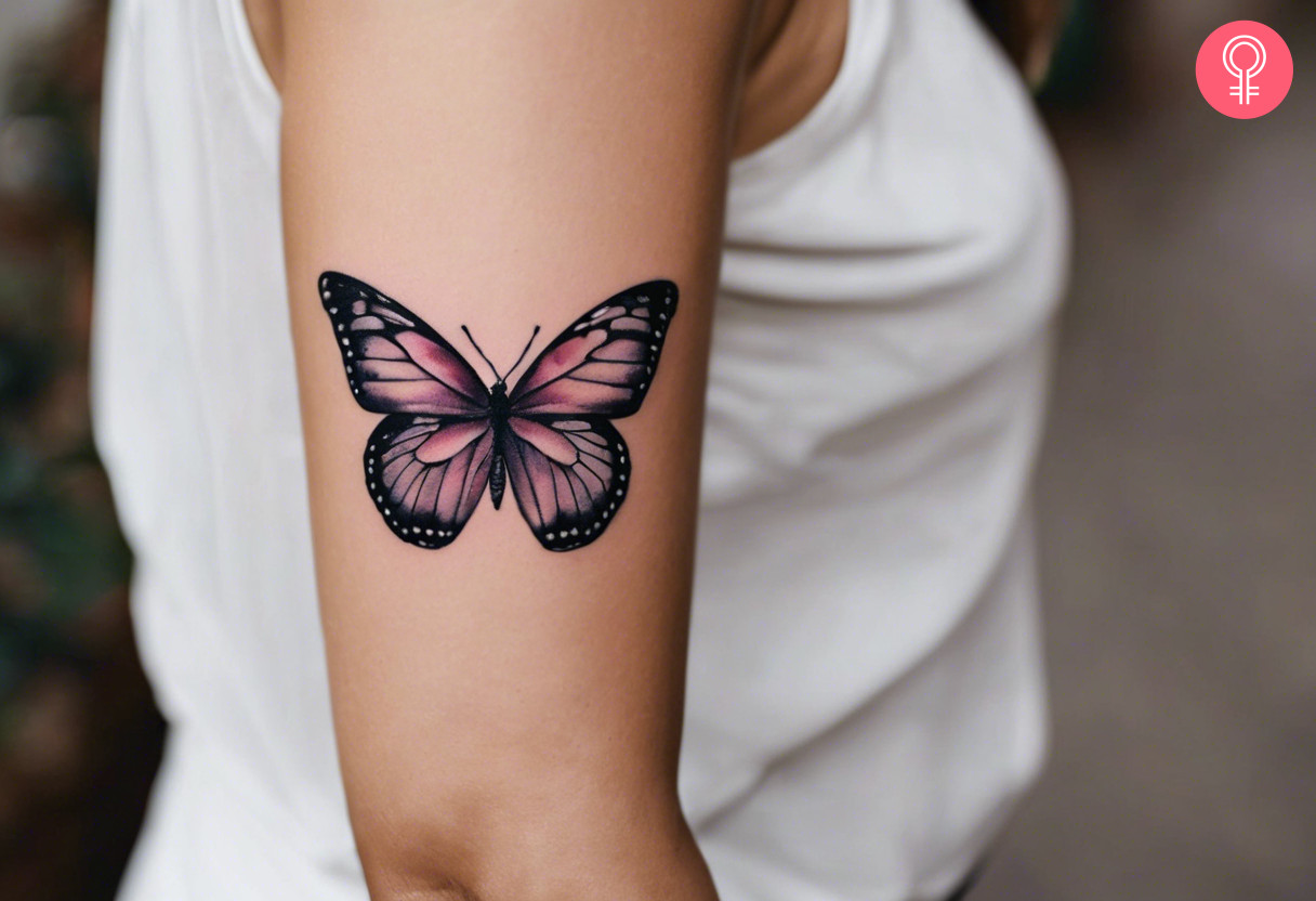 Woman with lupus butterfly tattoo on her arm