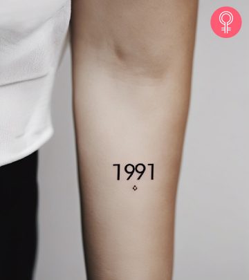 Woman with 1991 tattoo on her forearm
