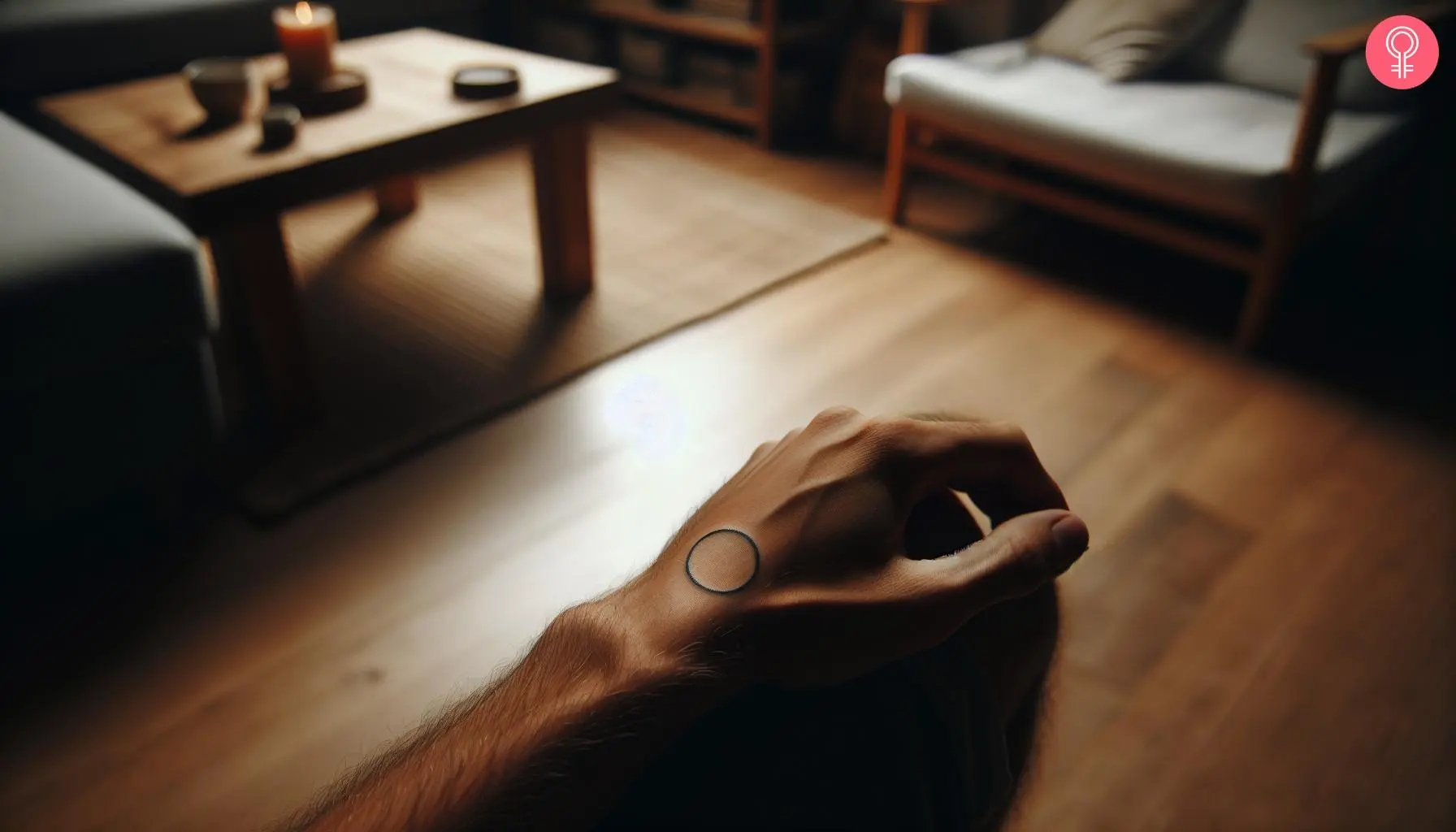 Minimalist circle tattoo on the hand