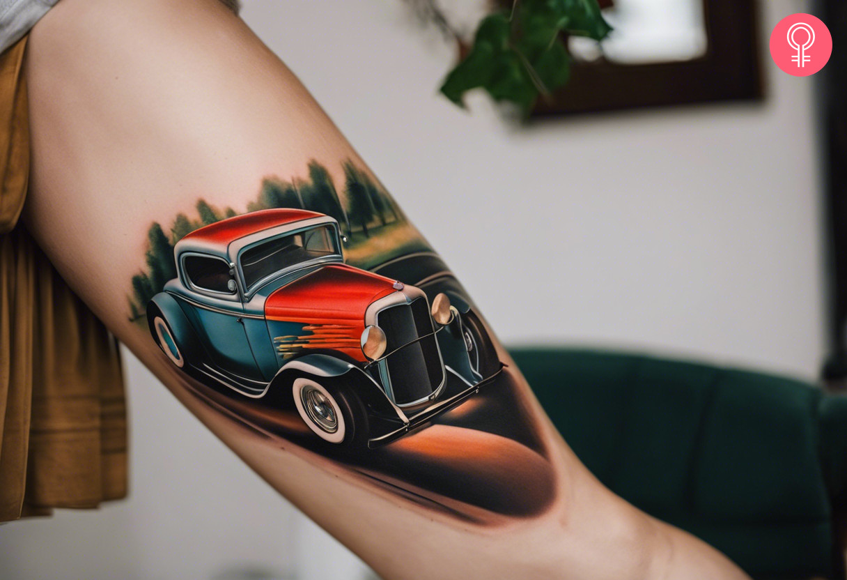 A woman with a vintage hot rod tattoo on her back