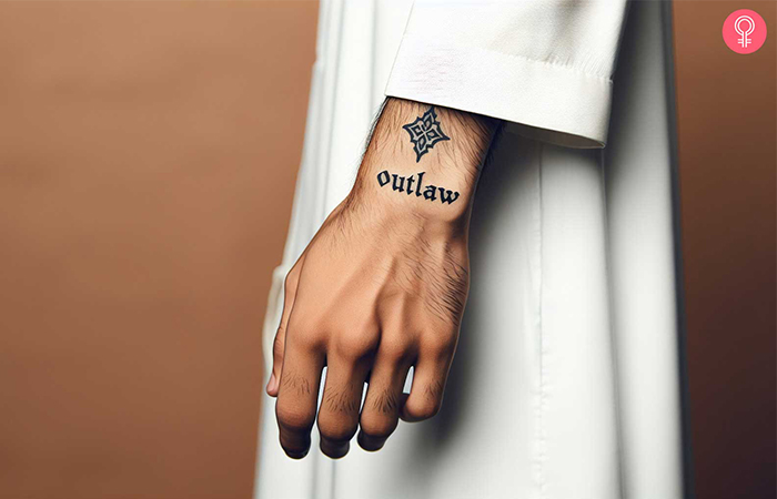 An outlaw text tattoo on the wrist