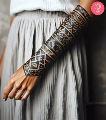 A piston tattoo on a woman’s arm