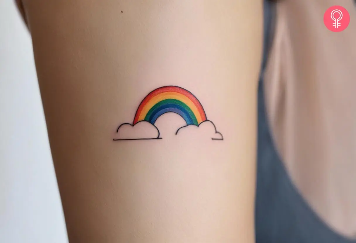 Rainbow bridge tattoo on a woman’s arm