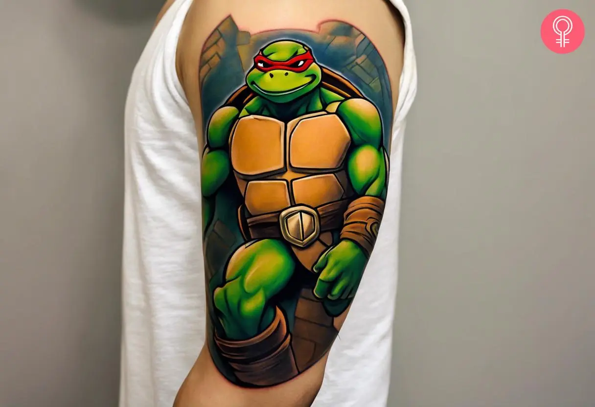 A colorful half-sleeve tattoo of Raphael on the upper arm