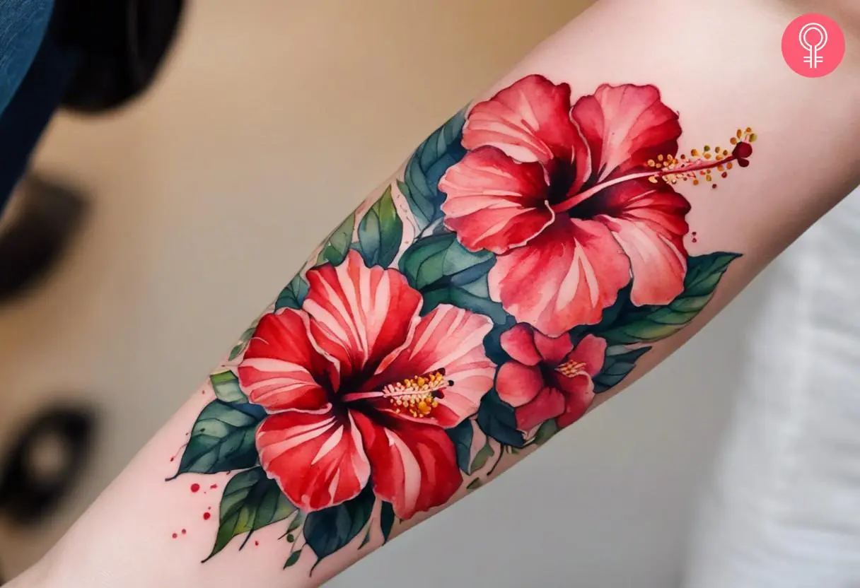 A realistic hibiscus flower tattoo on the forearm