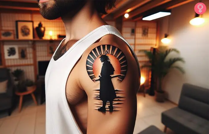 A man with a Samurai and rising sun tattoo on the upper arm.