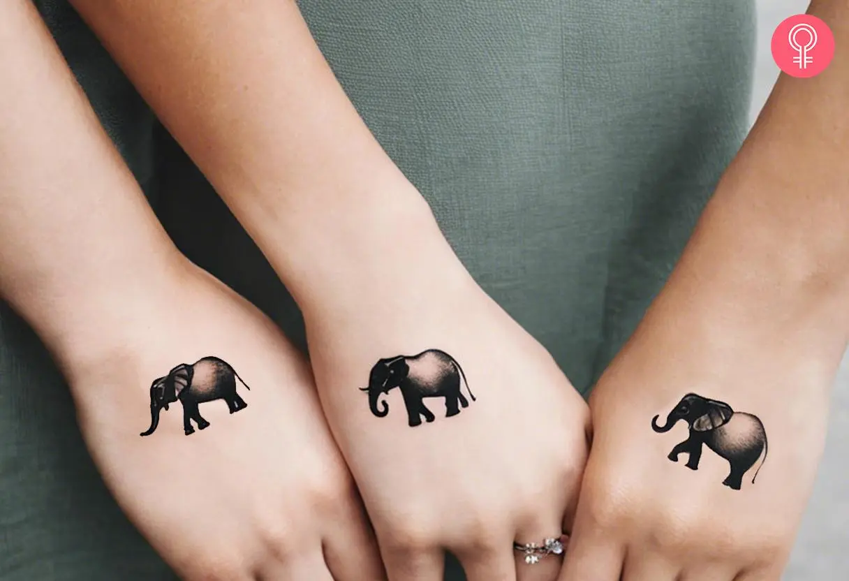 Three woman with matching elephant hand tattoos