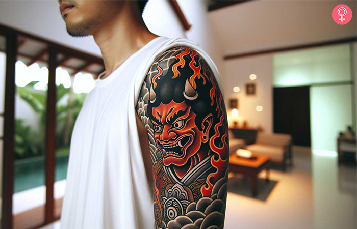 A traditional Fudo Myoo tattoo on a man’s upper arm