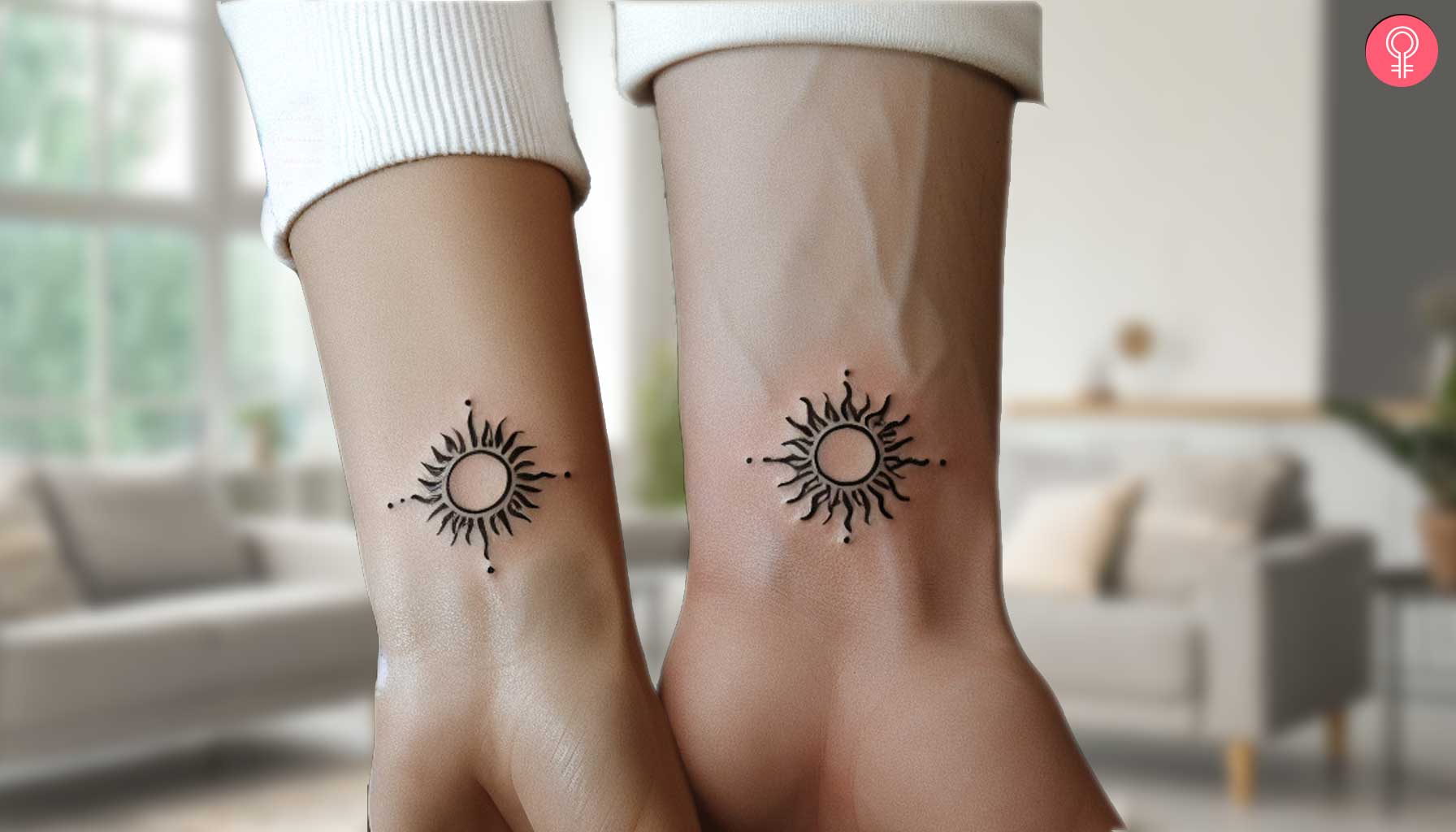 A matching tattoo of the Sun on the wrist