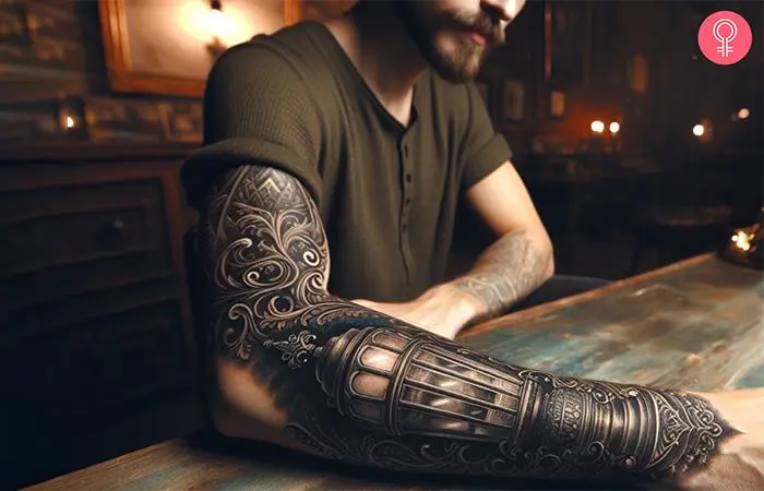 A man flaunting a Victorian gothic tattoo on his forearm