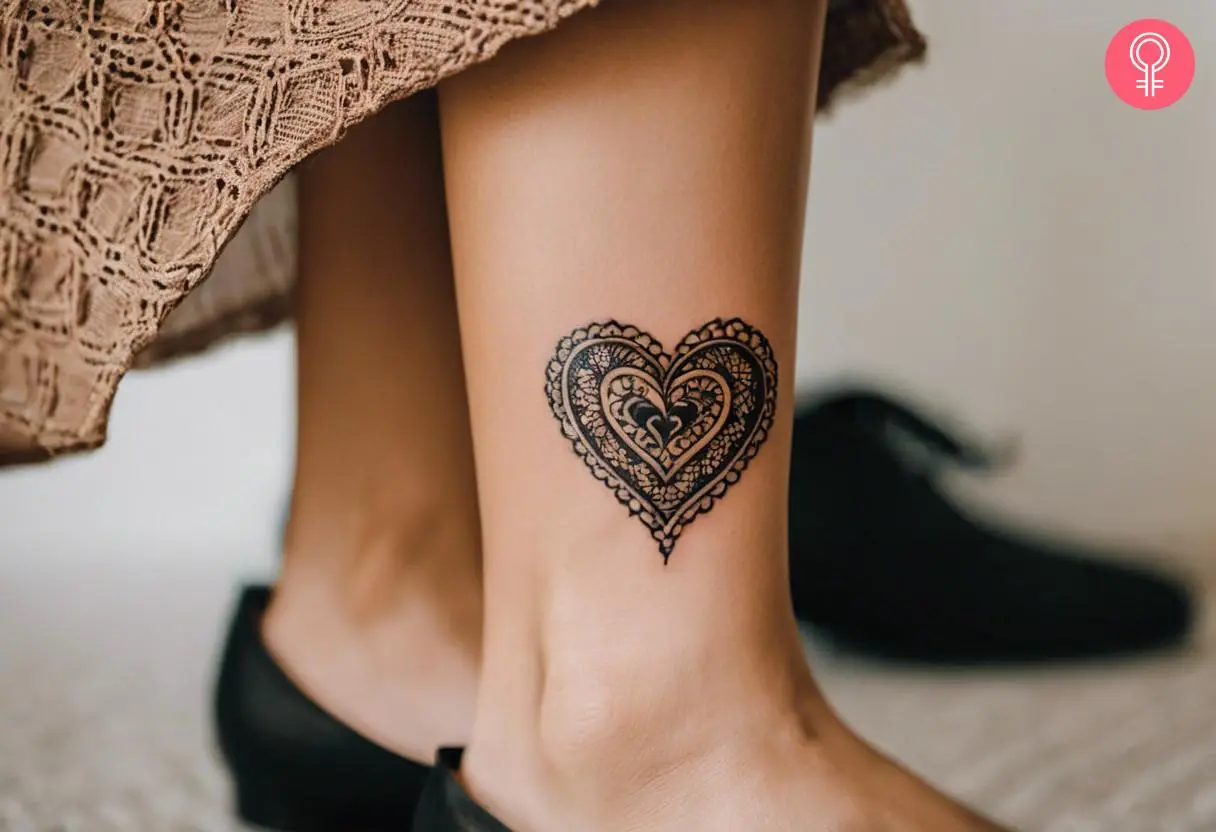 A woman flaunting a Victorian heart tattoo on her ankle