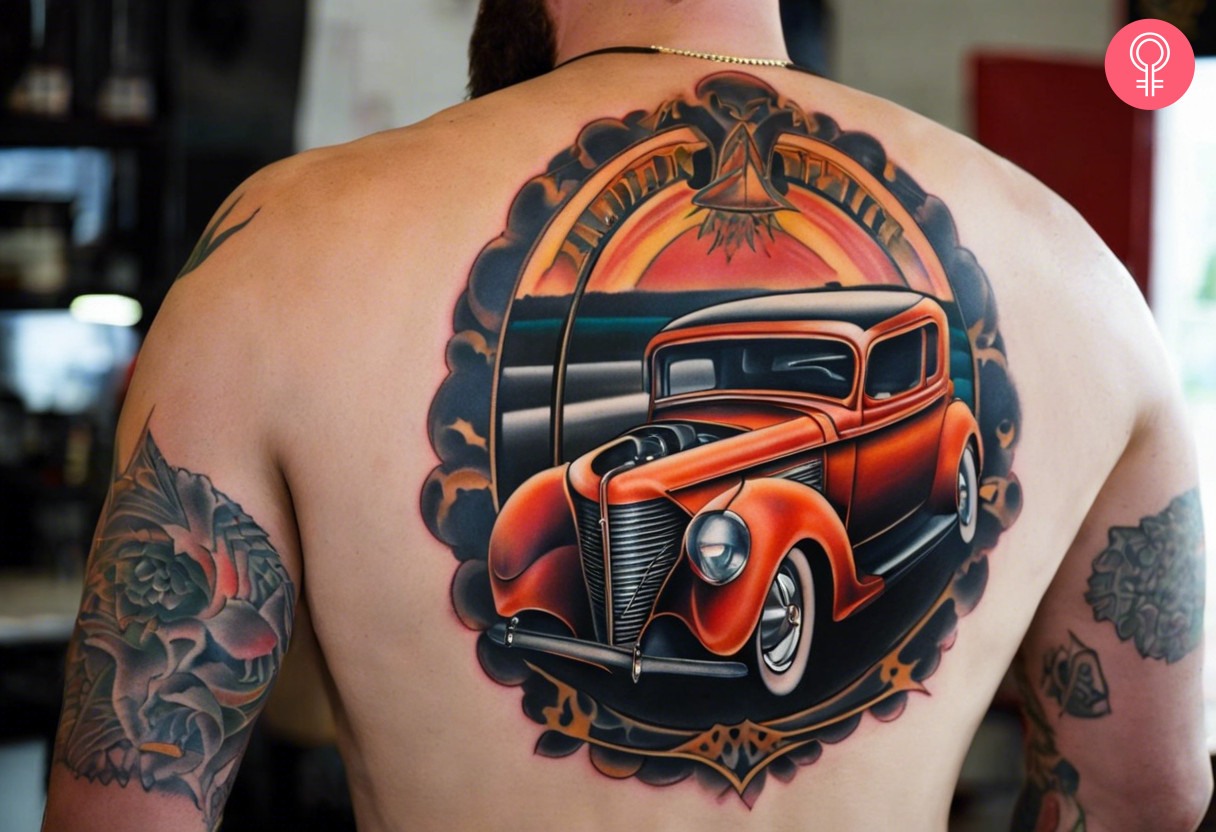 Man with a vintage hot rod tattoo at the back