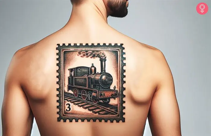 A man wearing a vintage postage stamp tattoo on the upper back