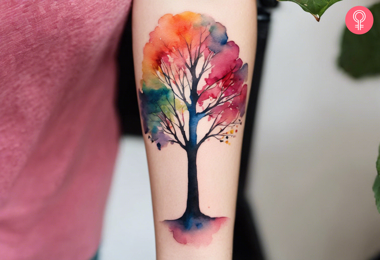 Watercolor tree tattoo on the forearm