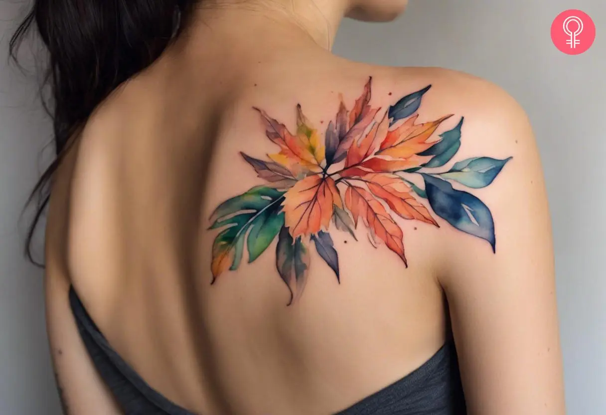 Watercolor foliage tattoo on the back of the shoulder