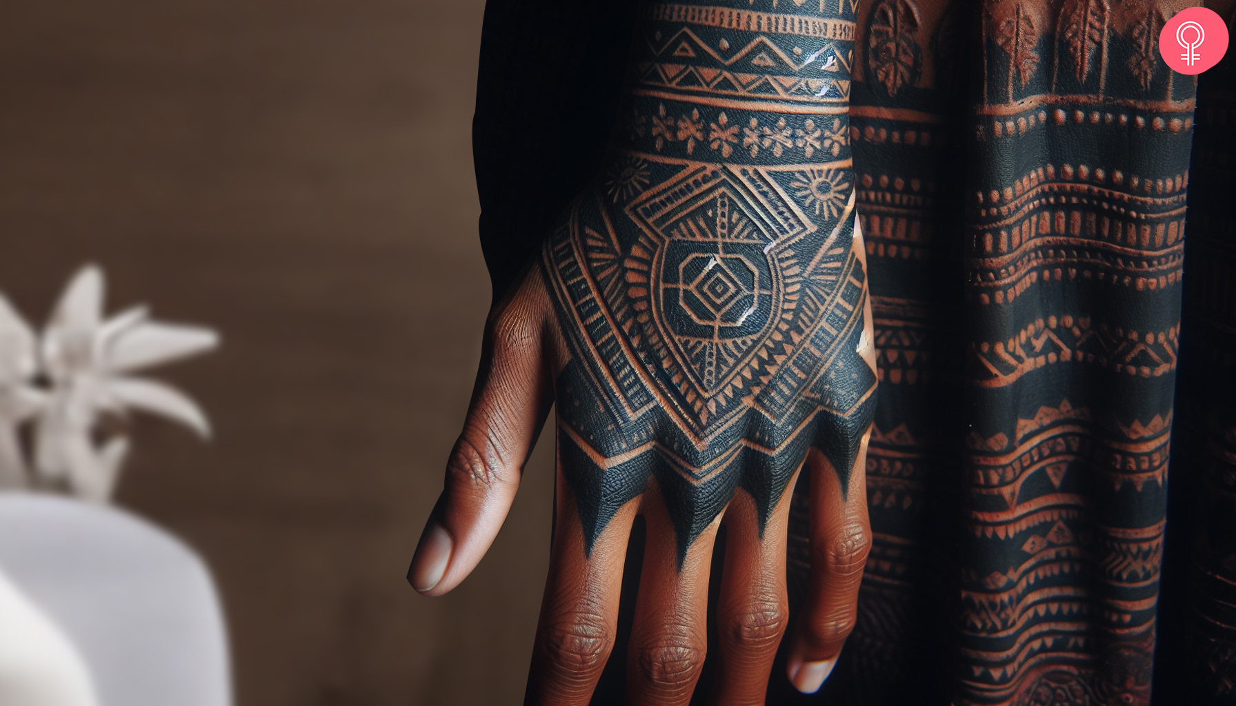 Woman with a Kalinga hand tattoo.