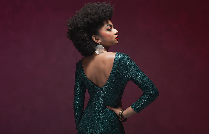 An African-American woman with a 1940s loose afro hairstyle