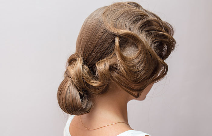 A woman sporting a 1920s hairstyle for long hair