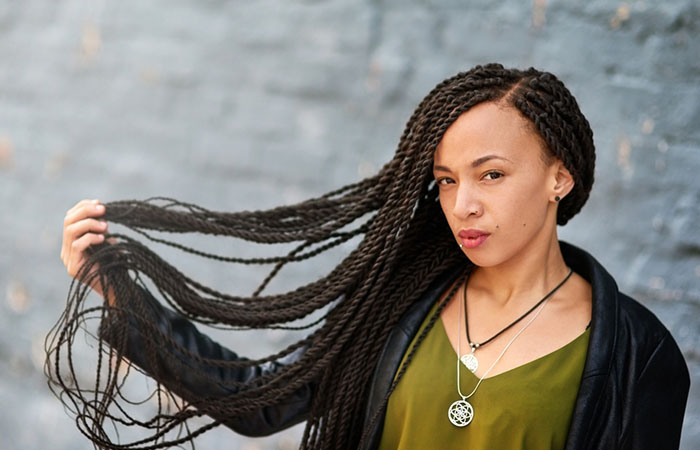 A woman with Senegalese twist hairstyle