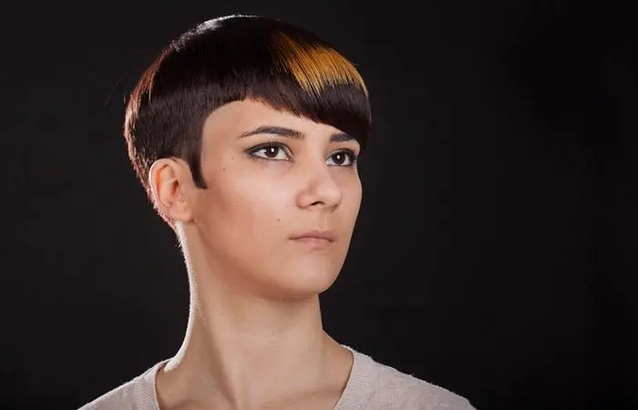 A woman with a mushroom haircut