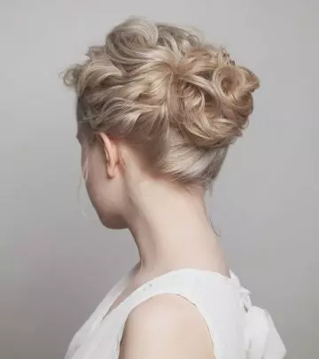 A woman with an elegant updo hairstyle