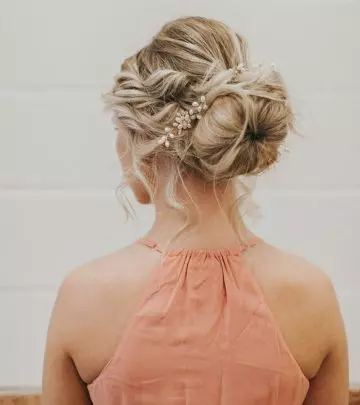 A woman with ballerina bun for homecoming