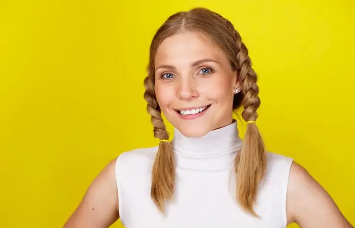 A woman with cute braids tied into pigtails