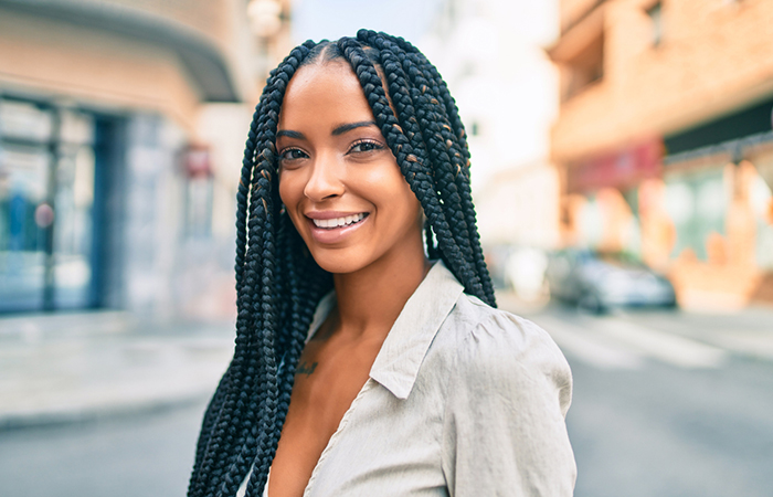 A woman with stylish box braids hairstyle