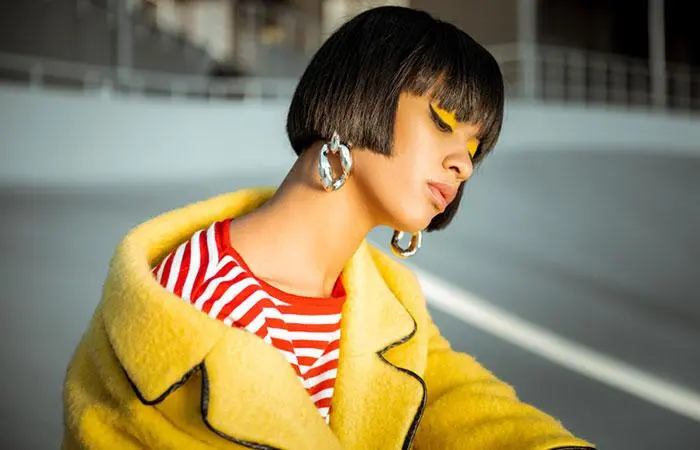 An African American woman sporting a 1920s hairstyle