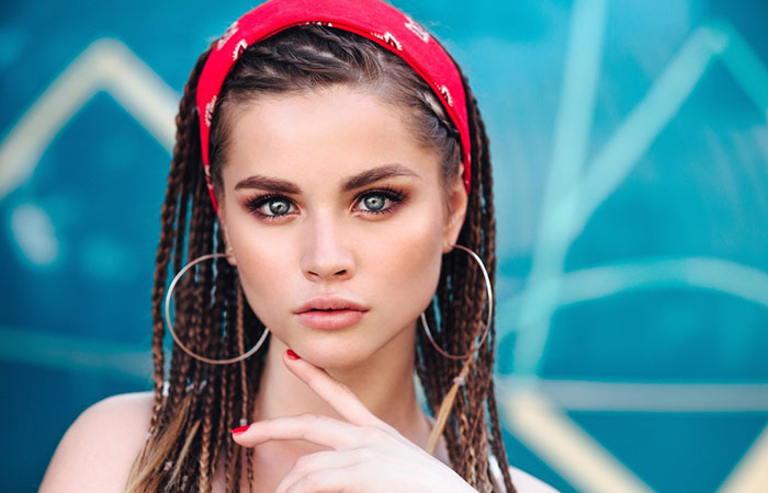 A woman with a bandana braid hairstyle