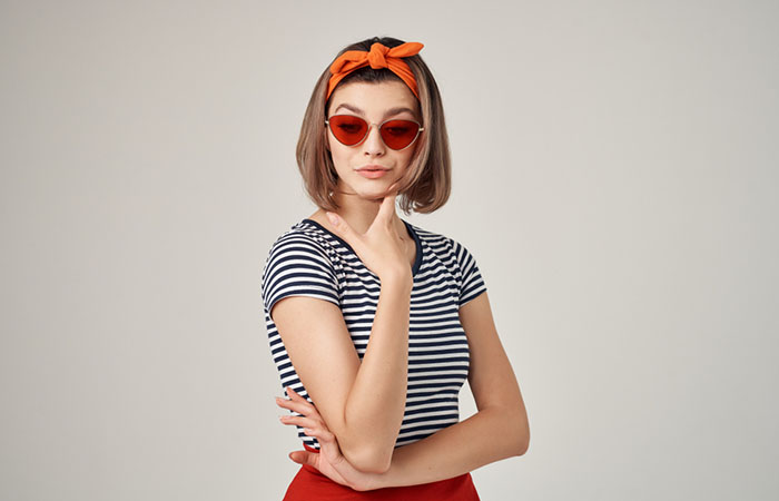 A woman with short hair bandana hairstyle