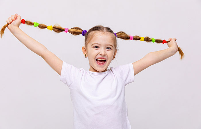 A girl flaunting bubble braids