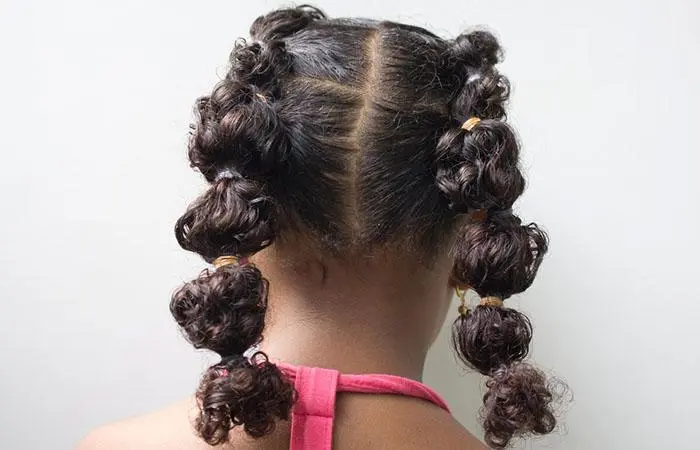 A girl flaunting bubble braids