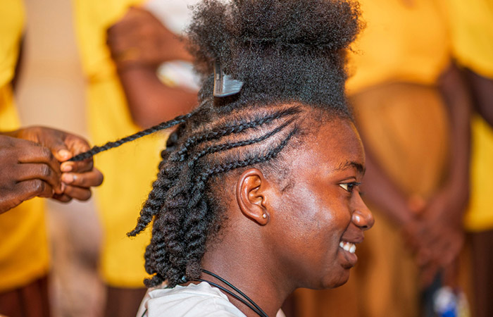 Close-up of a girl with flat twist hairstyle