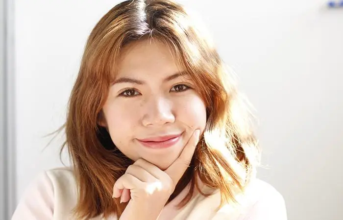 A young woman with a textured long bob