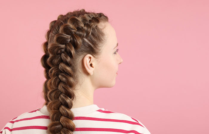 A girl flaunting French bubble braids