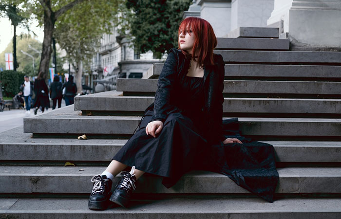 Woman with a goth fringe hairstyle