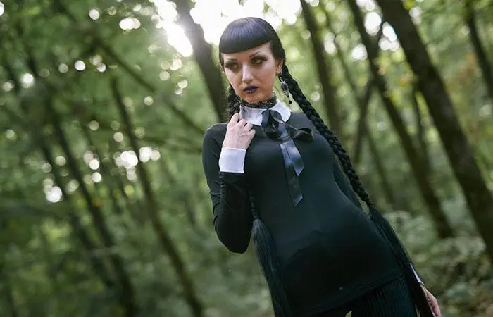 Woman with a braided goth hairstyle