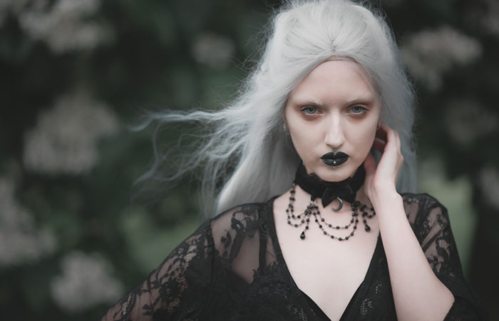 Woman with a gothic witchy hairstyle