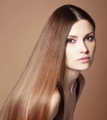 A woman with the popular 70s sleek straight hairstyle