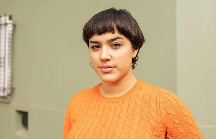 Woman with a choppy short pageboy haircut