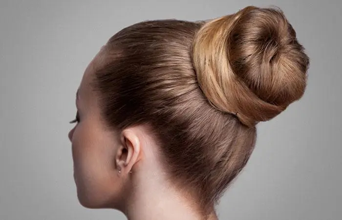 Woman with a volleyball bun hairstyle