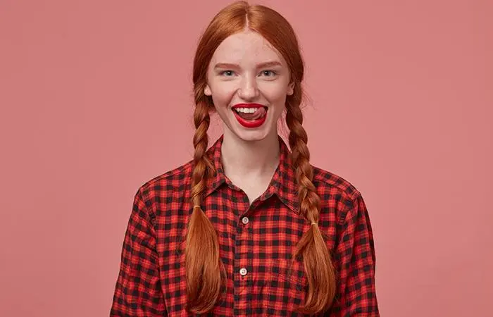 A woman with cute braids tied into pigtails