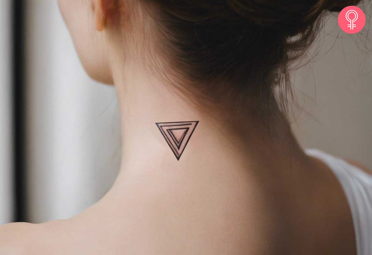 A think black concentric upside down triangle tattoo