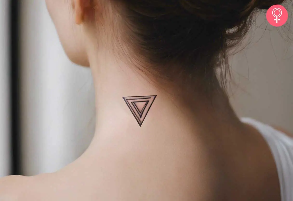 A think black concentric upside down triangle tattoo