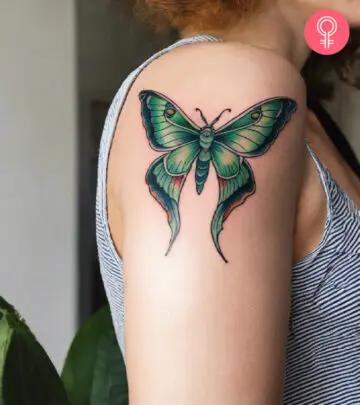 A woman flaunting a Yorkshire Terrier tattoo on her arm