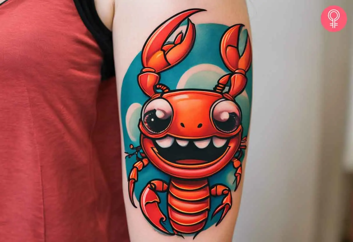 Cartoon lobster tattoo on the upper arm