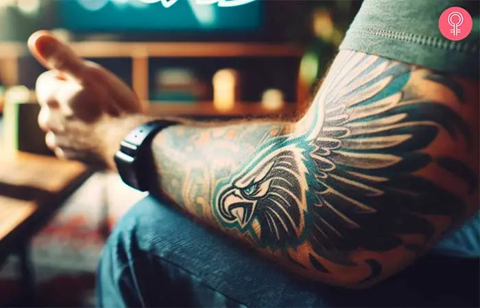 A man with a Philadelphia Eagles tattoo on his arm